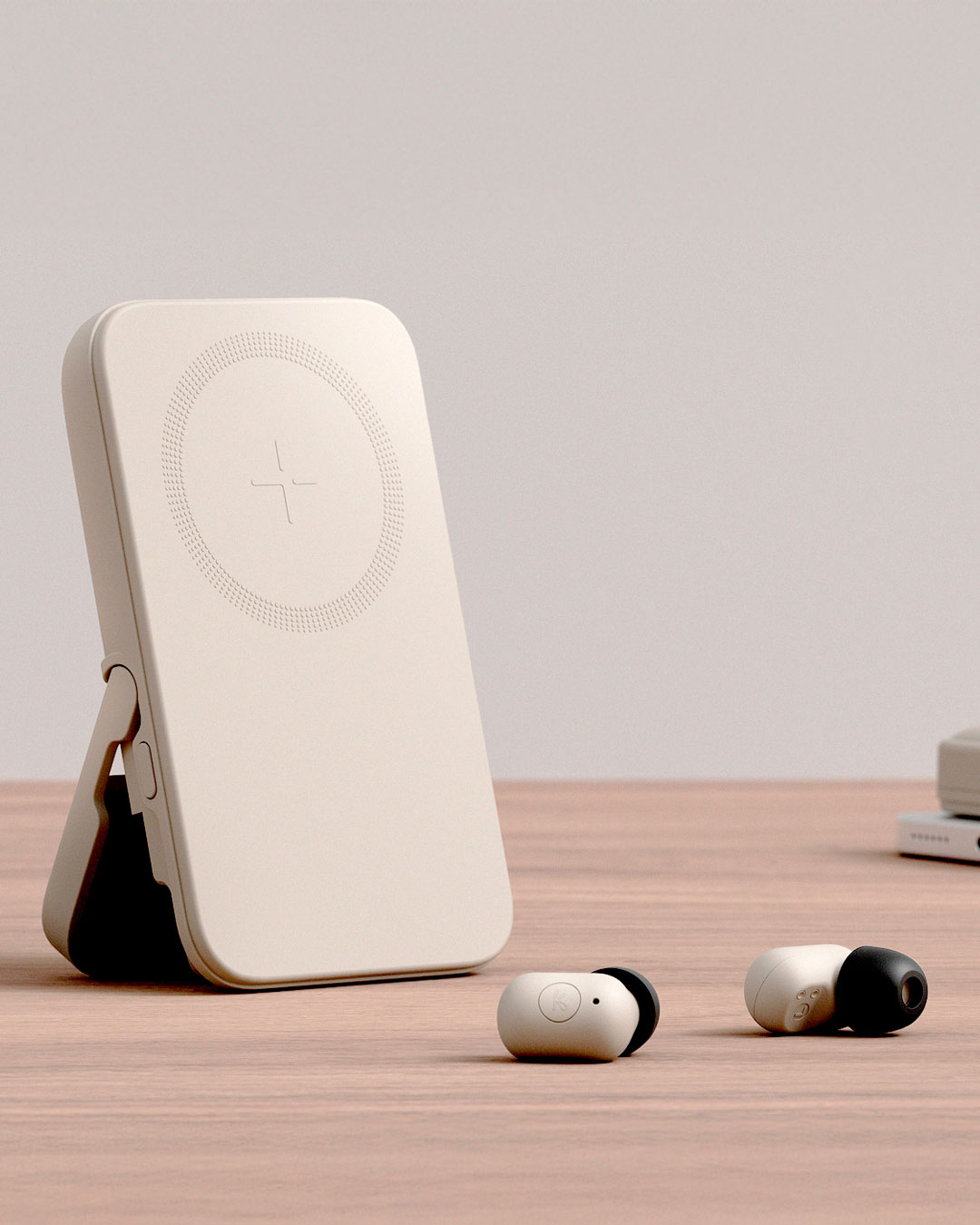 Trådløs powerbank med indbyggede øretelefoner