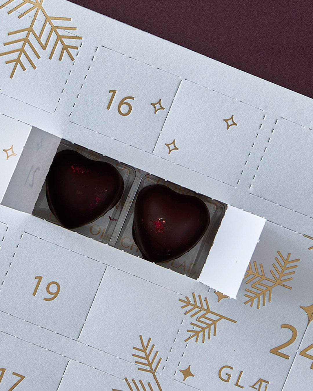 Delejulekalender med håndlavede chokolader - 550 G