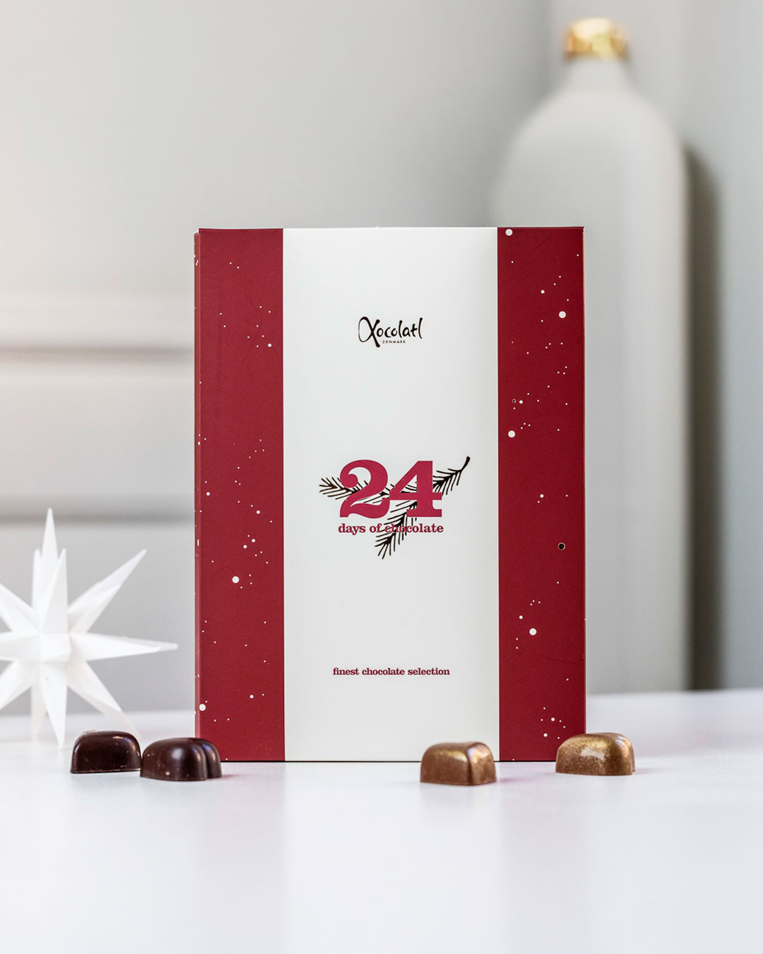 Smagfuld julekalender med fyldte chokolader - 125 g