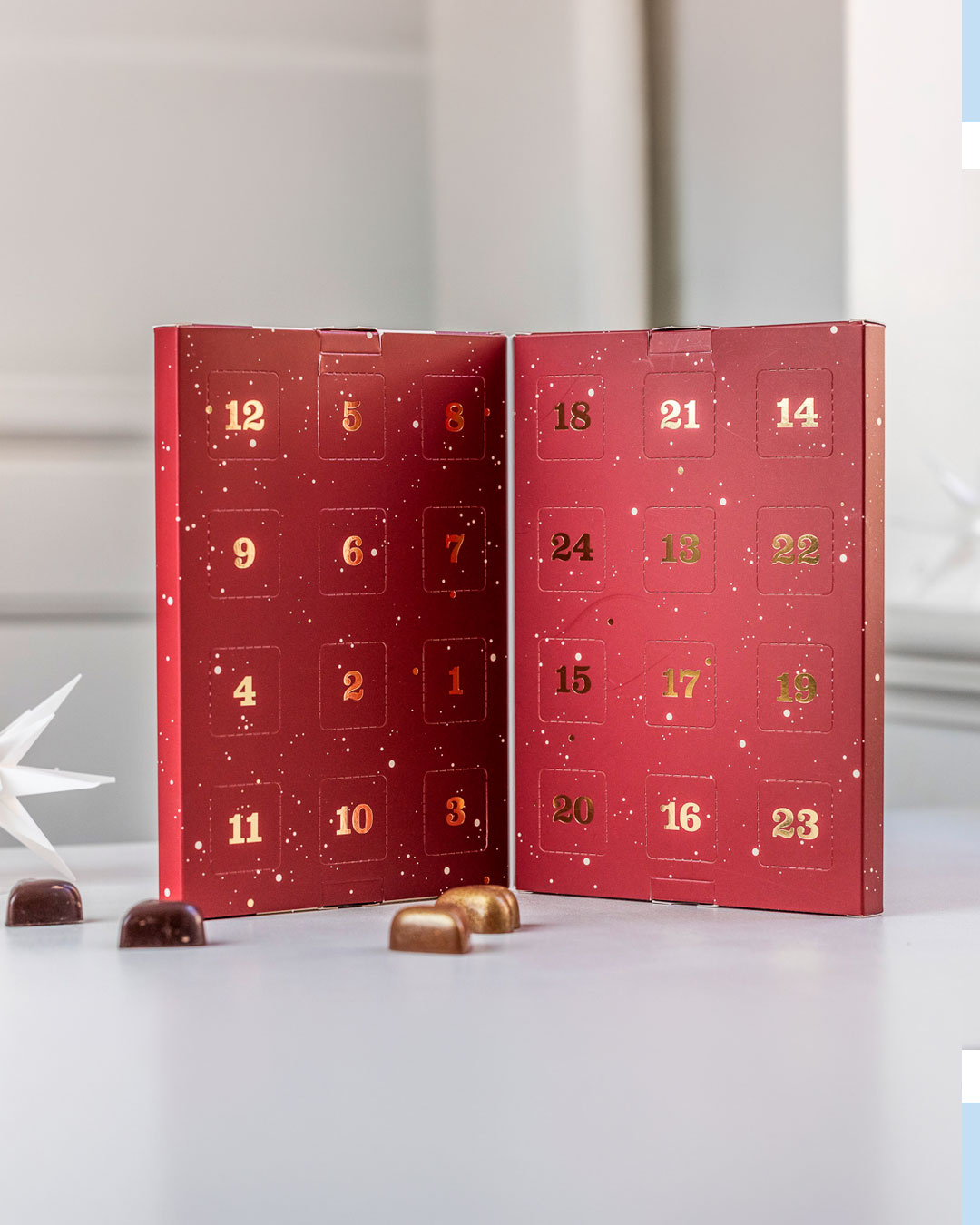 Smagfuld julekalender med fyldte chokolader - 125 g