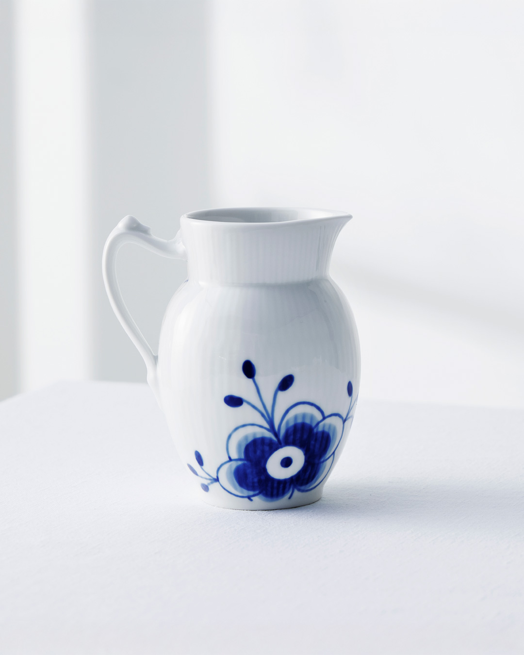 Elegant mjölkkanna i klassisk design